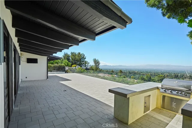 a view of a terrace with a garden