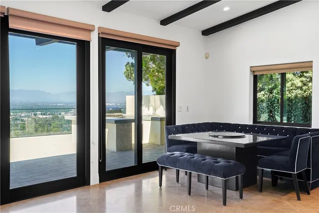 a room with furniture and a window