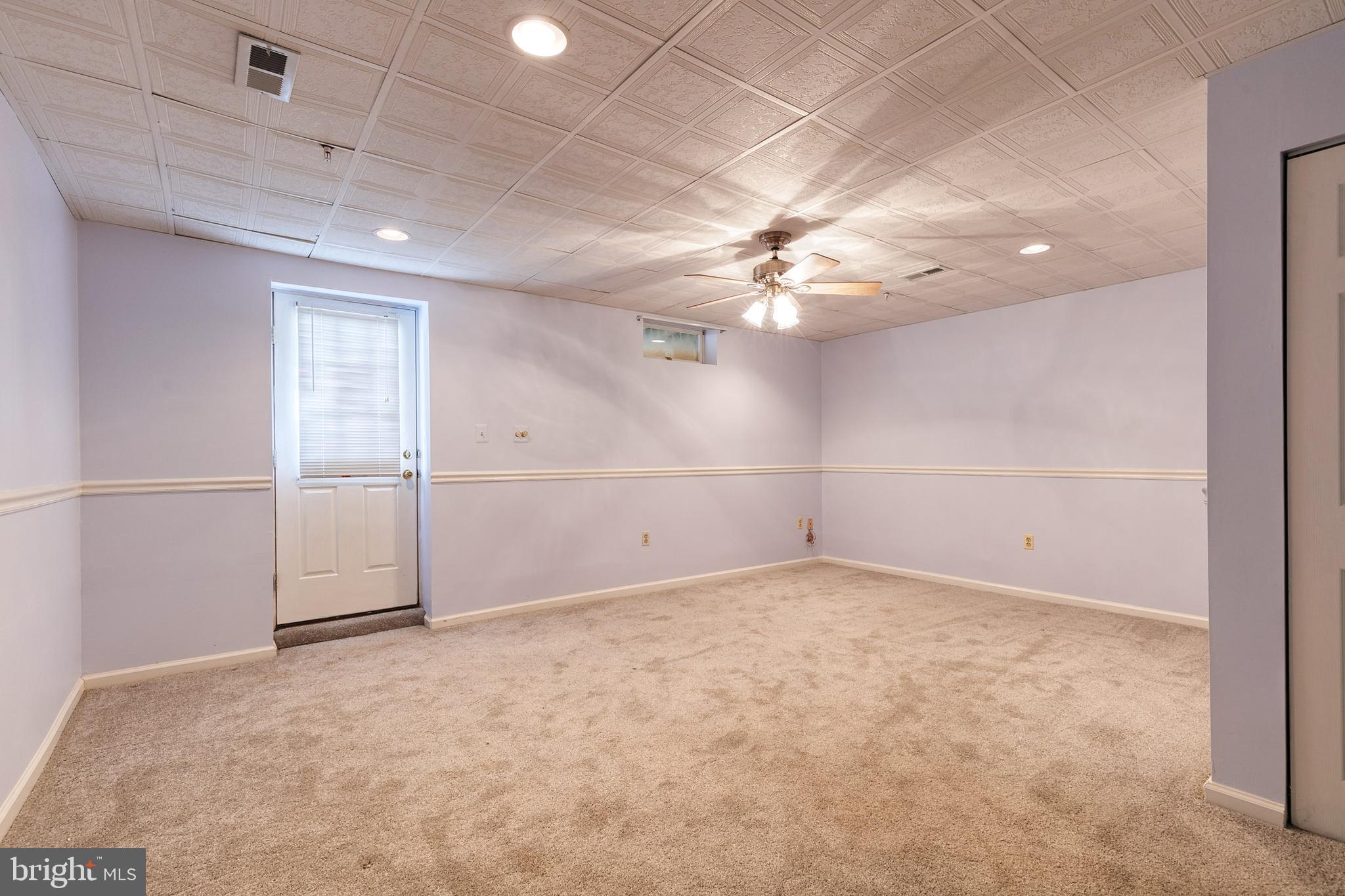 2107 Kyle Green Road Abingdon, MD 21009 - Photo 23 of 29 Lower level rec room w/ceiling fan & carpet