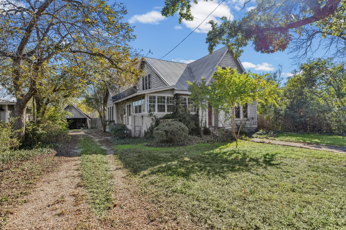 1006 Maple Street Lockhart, TX 78644 - Photo 2 of 32 View of front of property with a metal roof