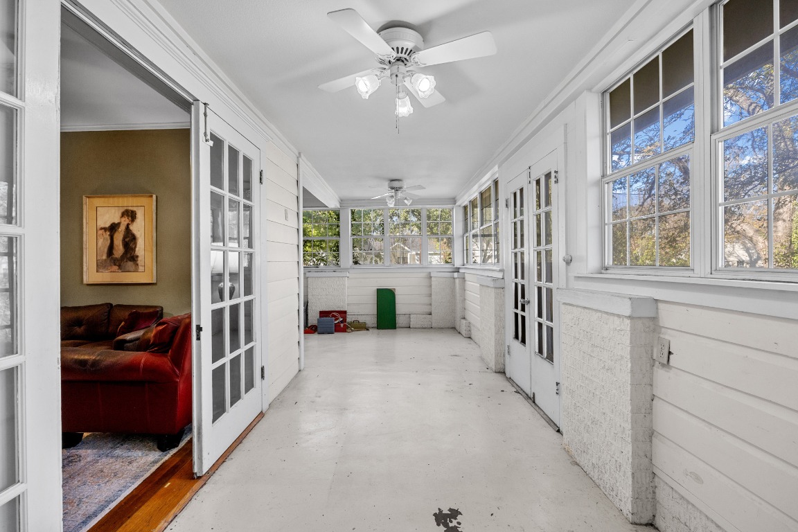 1006 Maple Street Lockhart, TX 78644 - Photo 27 of 32 Sunroom / solarium featuring french doors and a ceiling fan