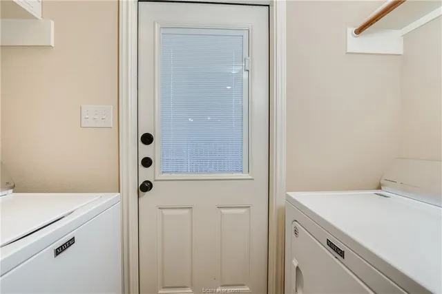 a bathroom with a shower sink and vanity