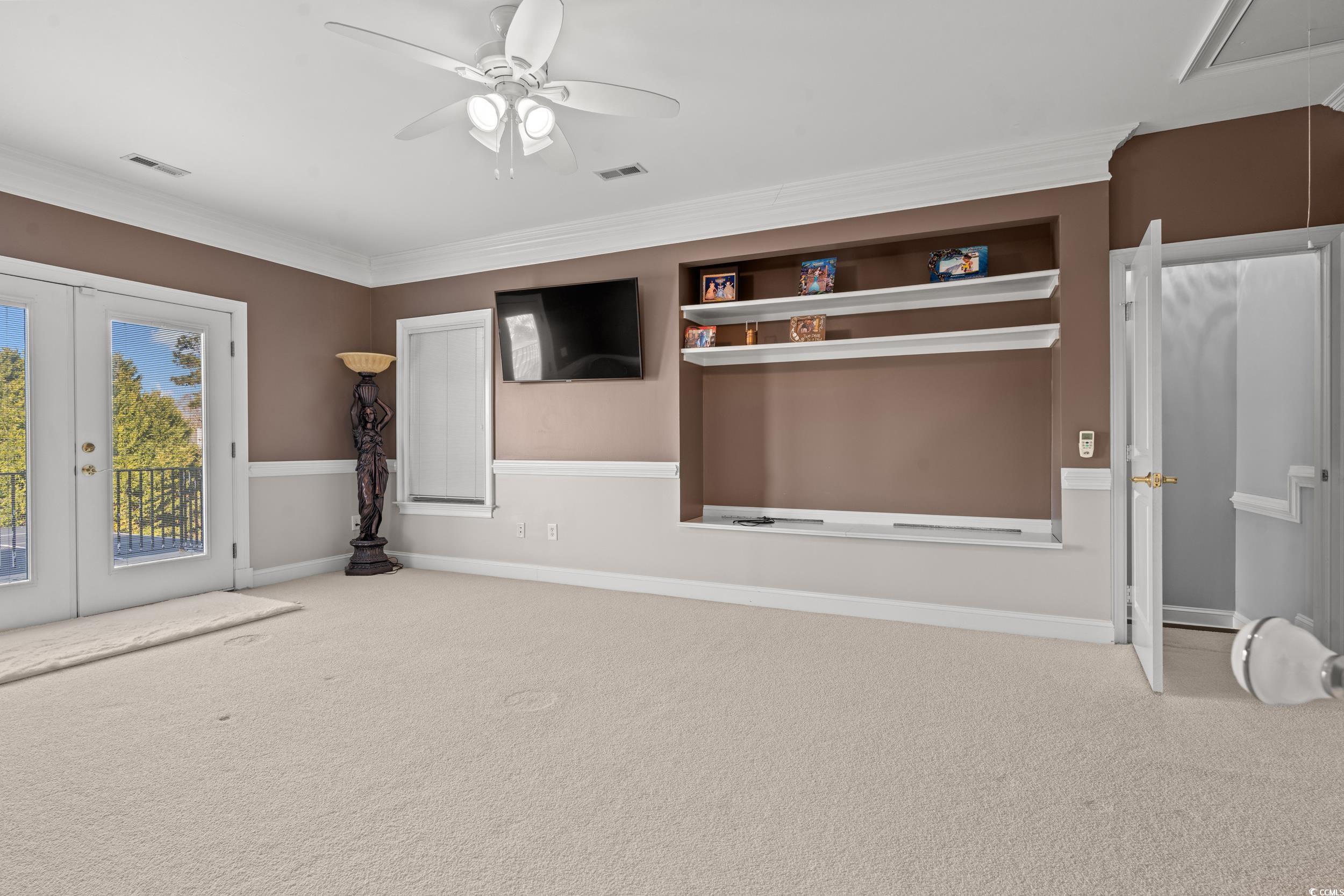 117 Ashley River Road Myrtle Beach, SC 29588 - Photo 28 of 38 Unfurnished living room featuring ornamental moldi