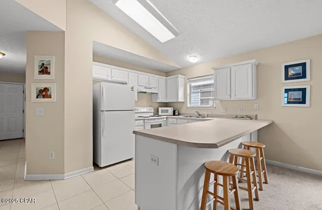 $305,000 | 207 Emerald Coast Club Boulevard, Panama City Beach, FL 32407