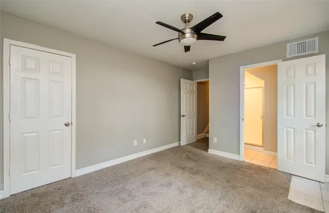 wooden floor in an empty room and a window