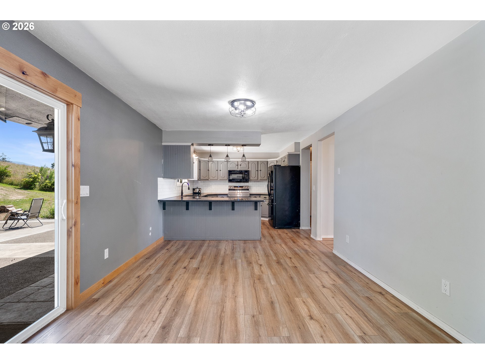 850 Hodgdon Road Tillamook, OR 97141 - Photo 10 of 43 a view of a kitchen with a sink and a refrigerator