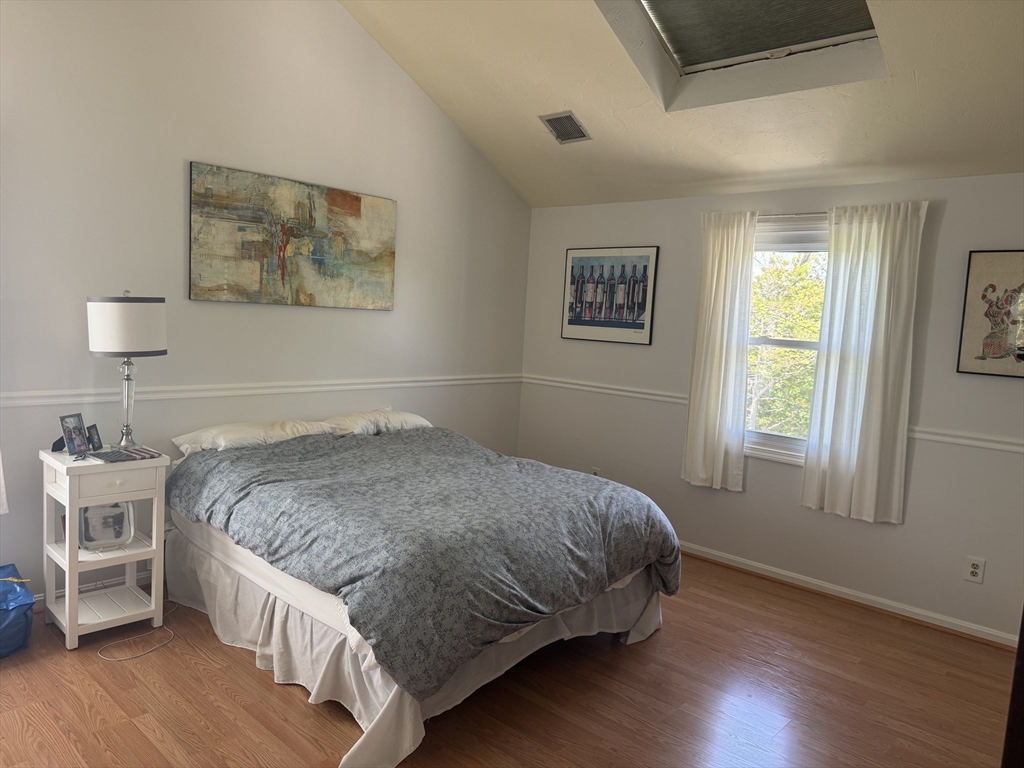 38 Crescent Road, Unit 38 Needham, MA 02494 - Photo 8 of 23 a bedroom with a bed and a window
