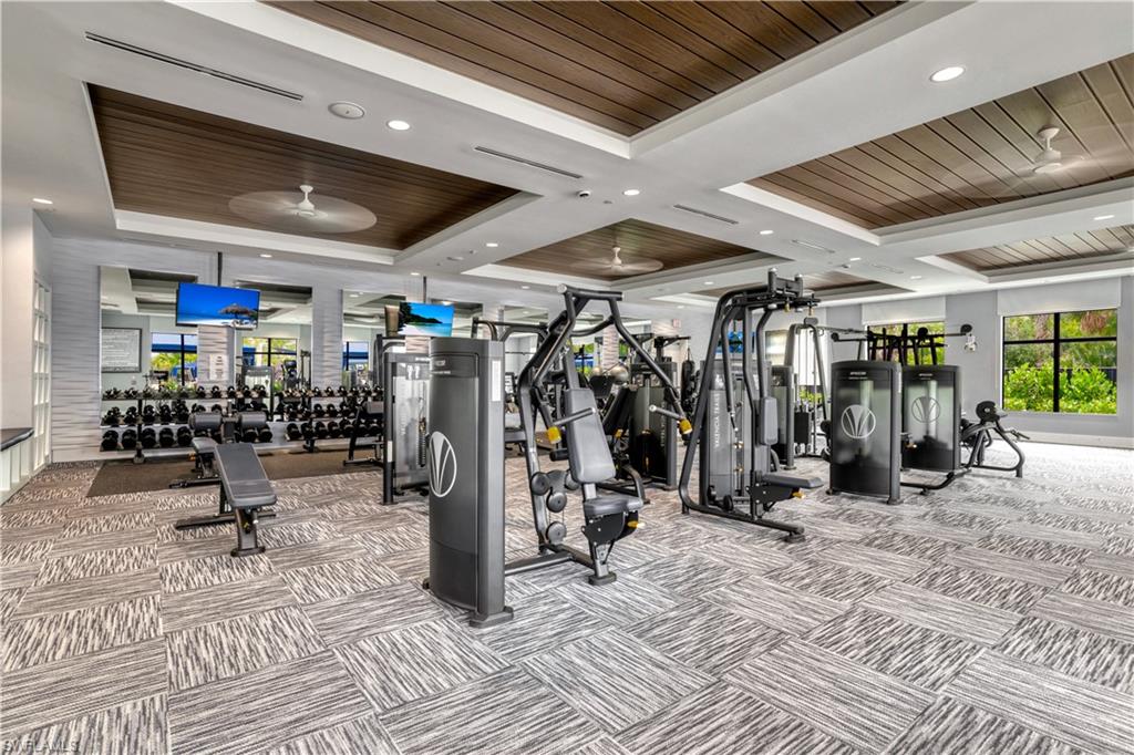 12456 Violet Lane Naples, FL 34120 - Photo 31 of 34 a view of a room with gym equipment