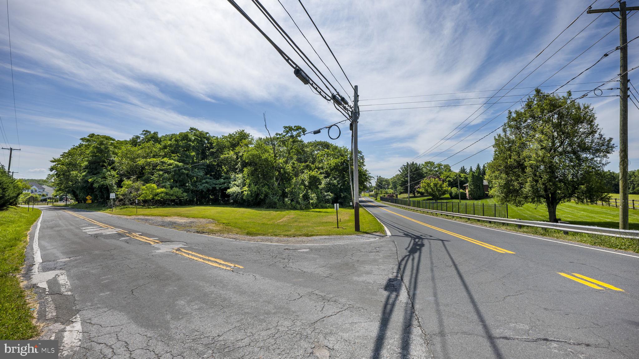 Beallsville Road Poolesville, MD 20837 - Photo 19 of 21 a view of swimming pool with a yard and trees in the background