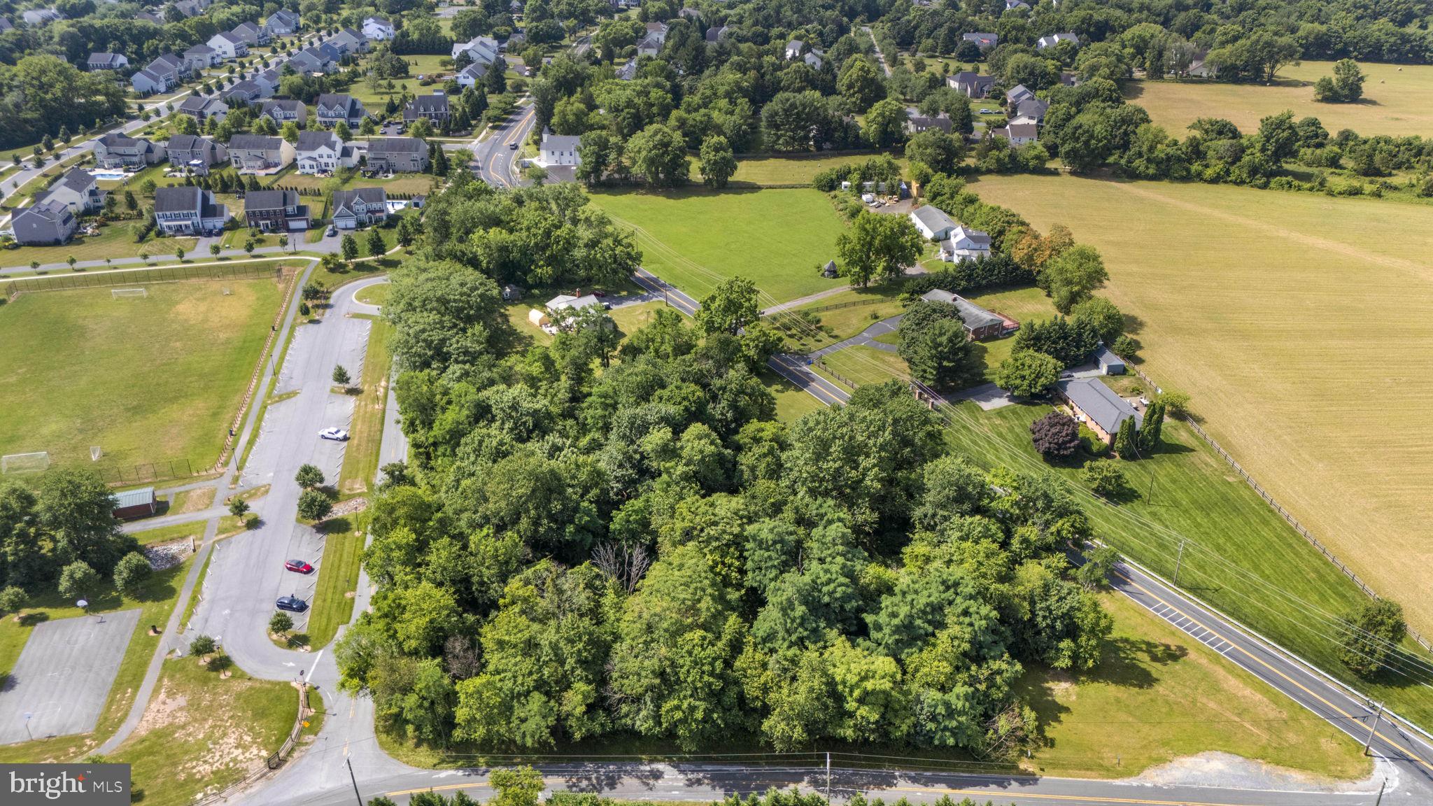 Beallsville Road Poolesville, MD 20837 - Photo 5 of 21 an aerial view of a houses with a lake view