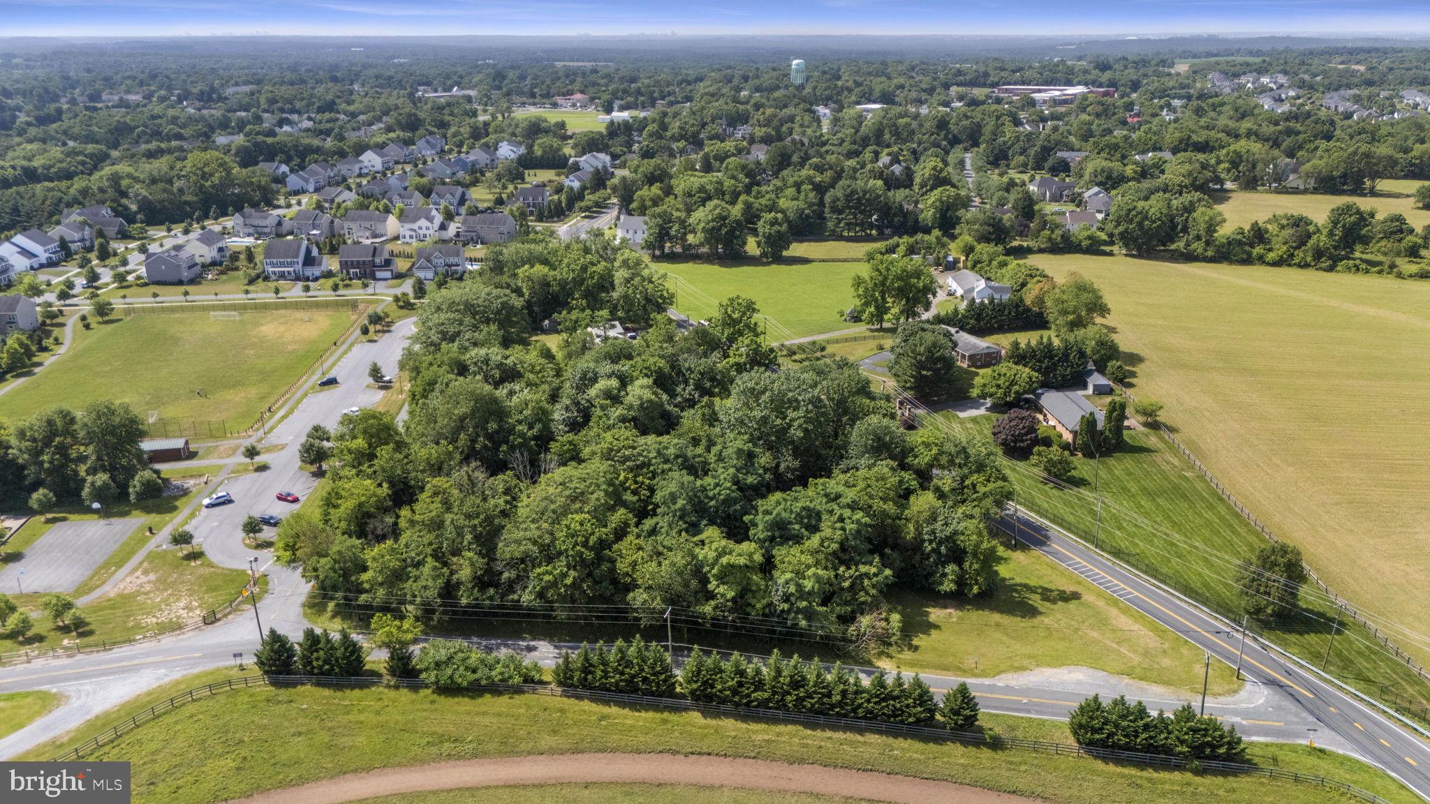 Beallsville Road Poolesville, MD 20837 - Photo 6 of 21 an aerial view of residential houses with outdoor space and lake view