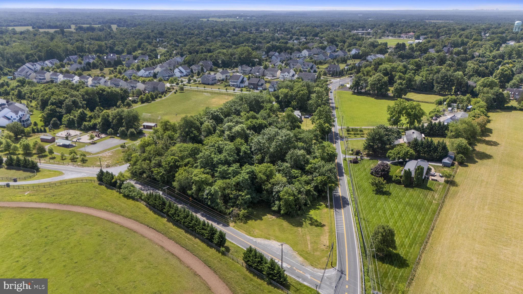 Beallsville Road Poolesville, MD 20837 - Photo 7 of 21 an aerial view of residential houses with outdoor space and swimming pool