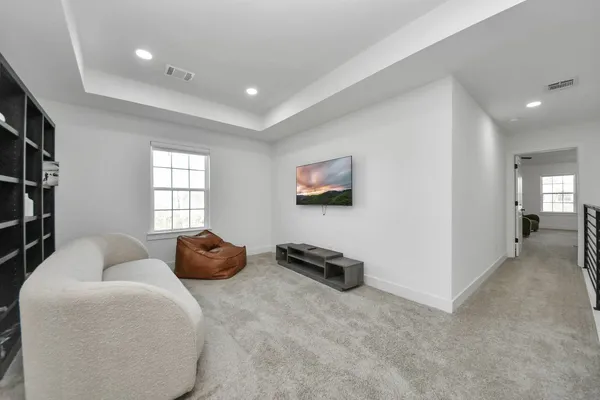 a room with furniture and a window