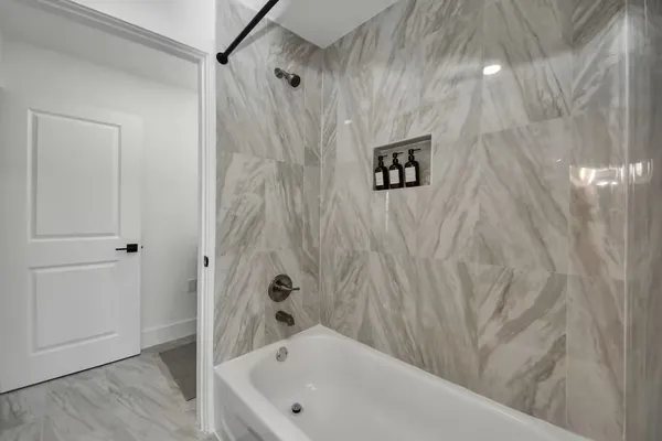 a bathroom with a bathtub