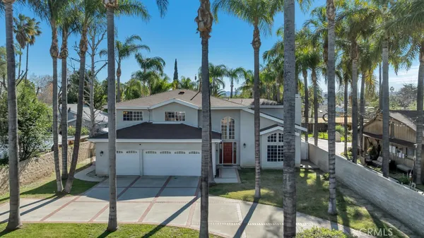 a view of a house with a swimming pool