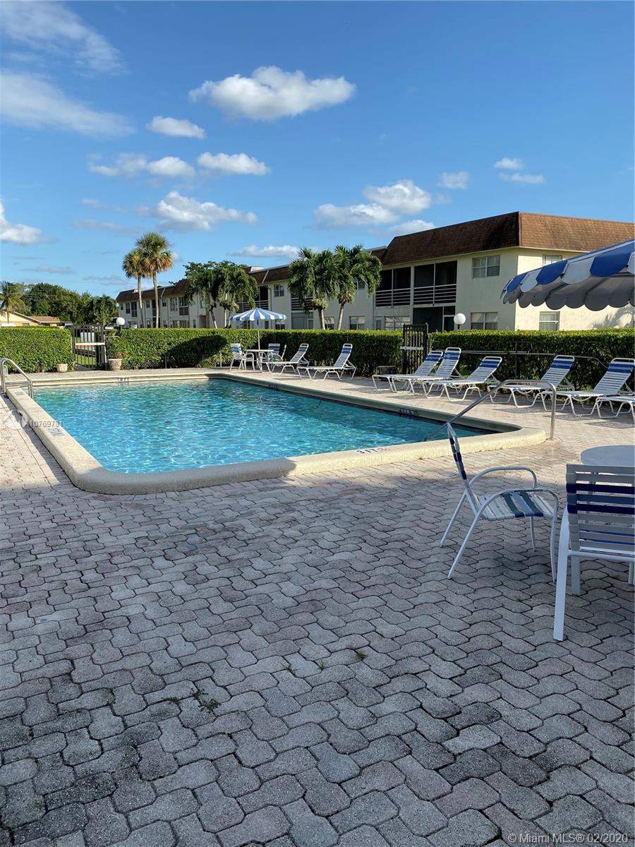 9855 Sandalfoot Boulevard, Unit 318 Boca Raton, FL 33428 - Photo 1 of 36