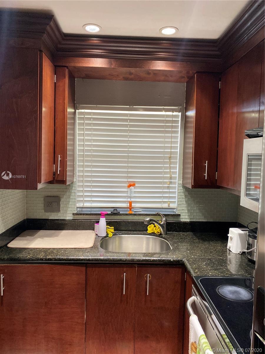 9855 Sandalfoot Boulevard, Unit 318 Boca Raton, FL 33428 - Photo 14 of 36