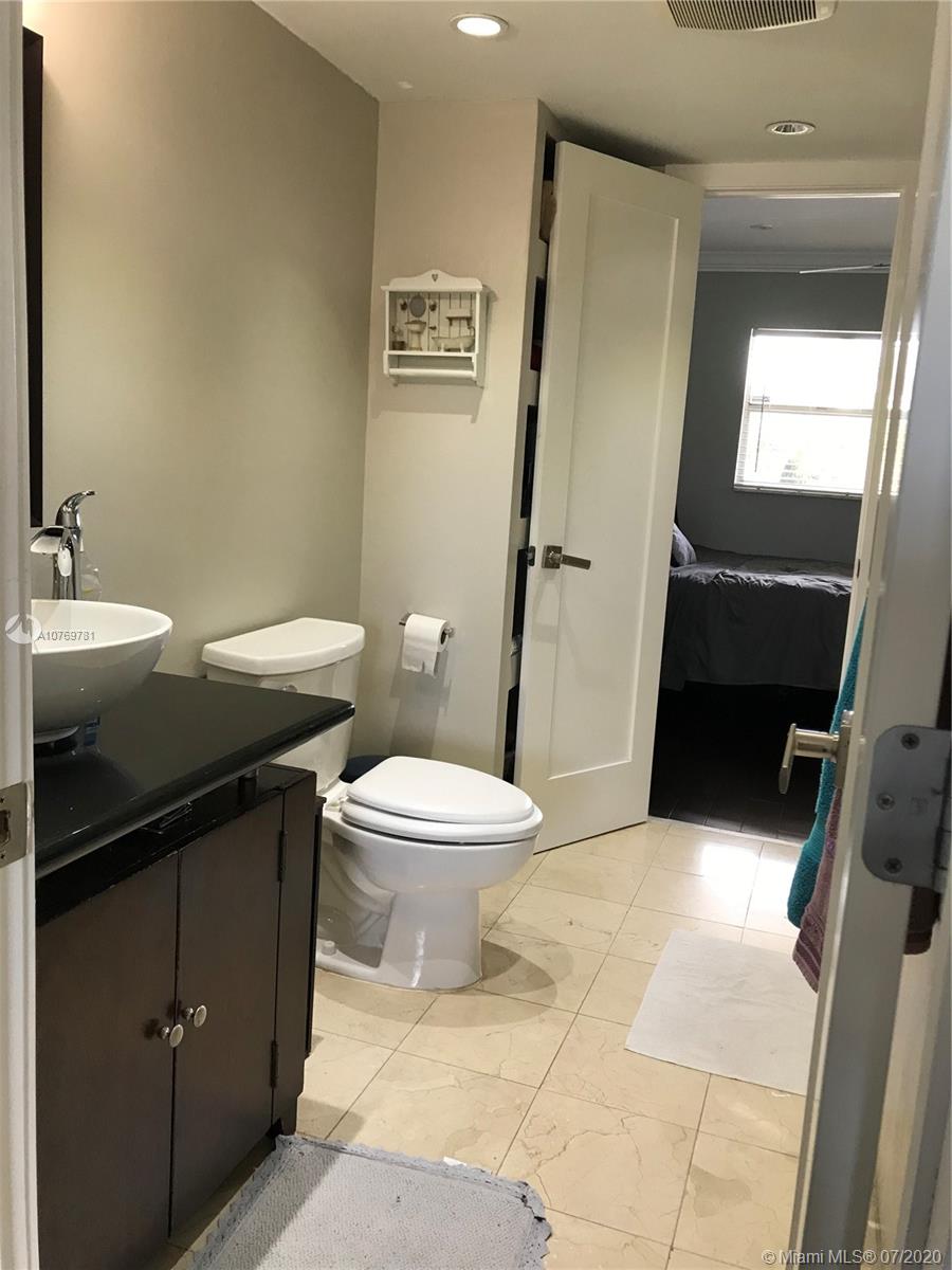 9855 Sandalfoot Boulevard, Unit 318 Boca Raton, FL 33428 - Photo 18 of 36 Bathroom