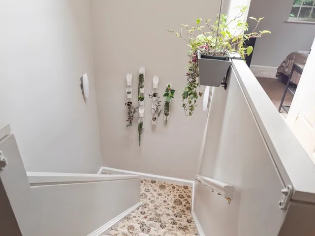 a view of bathroom with a sink and mirror