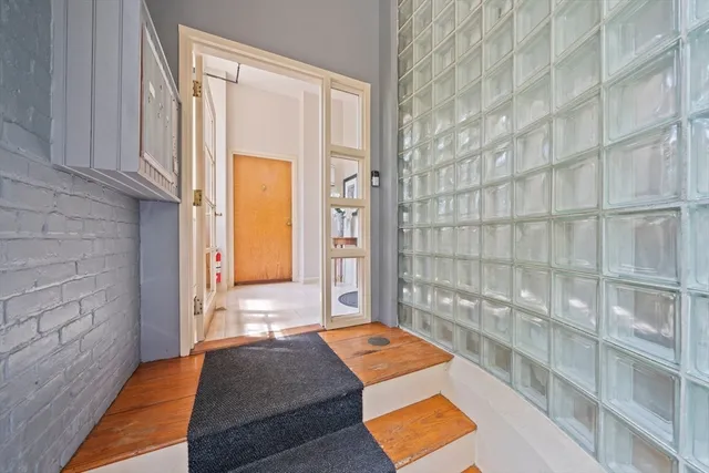 a bathroom with a bathtub and shower