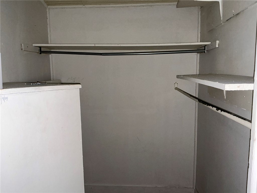 504 Caughlin Avenue Anderson, SC 29624 - Photo 11 of 15 Functional closet space offers integrated shelving and convenient hanging rods for organized storage.