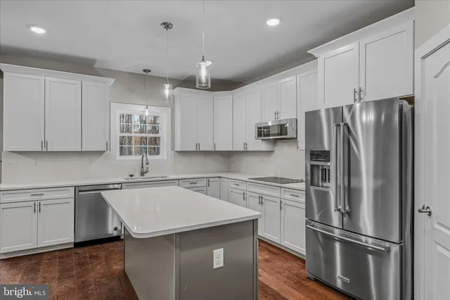 a bathroom with a sink double vanity and a mirror