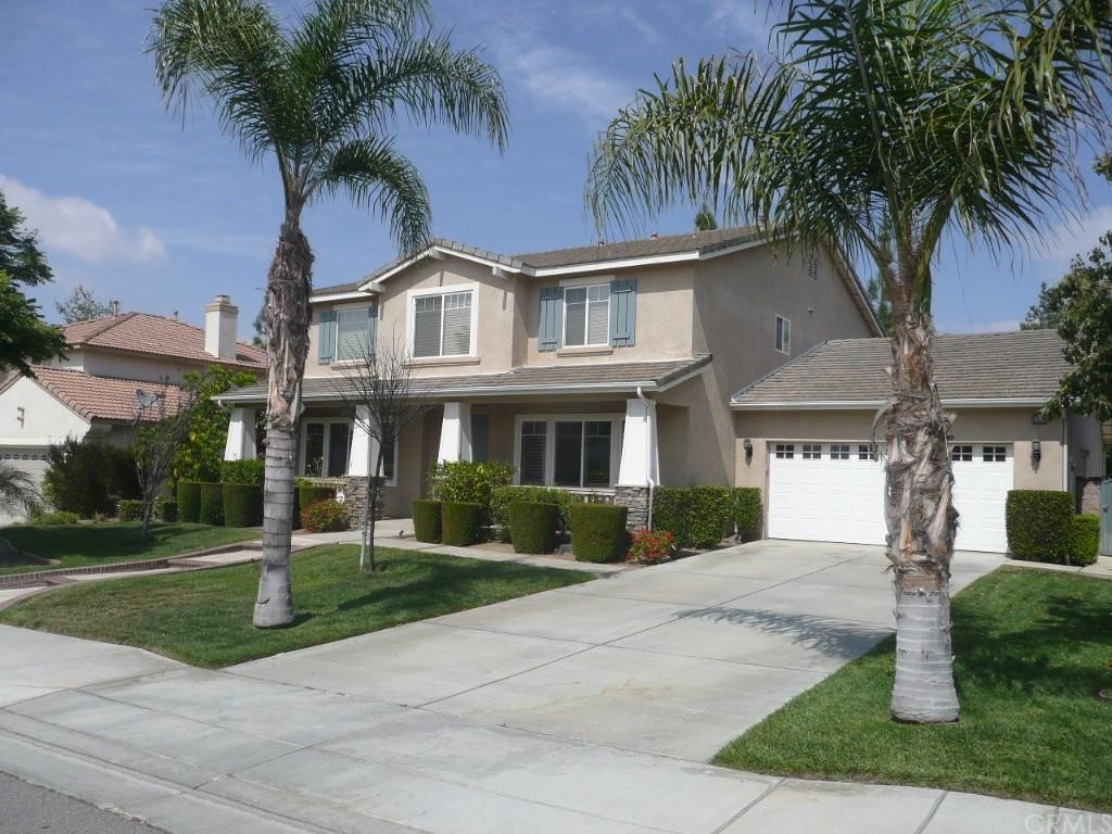 West facing home with lush landscaping and large driveway. Welcome Home!