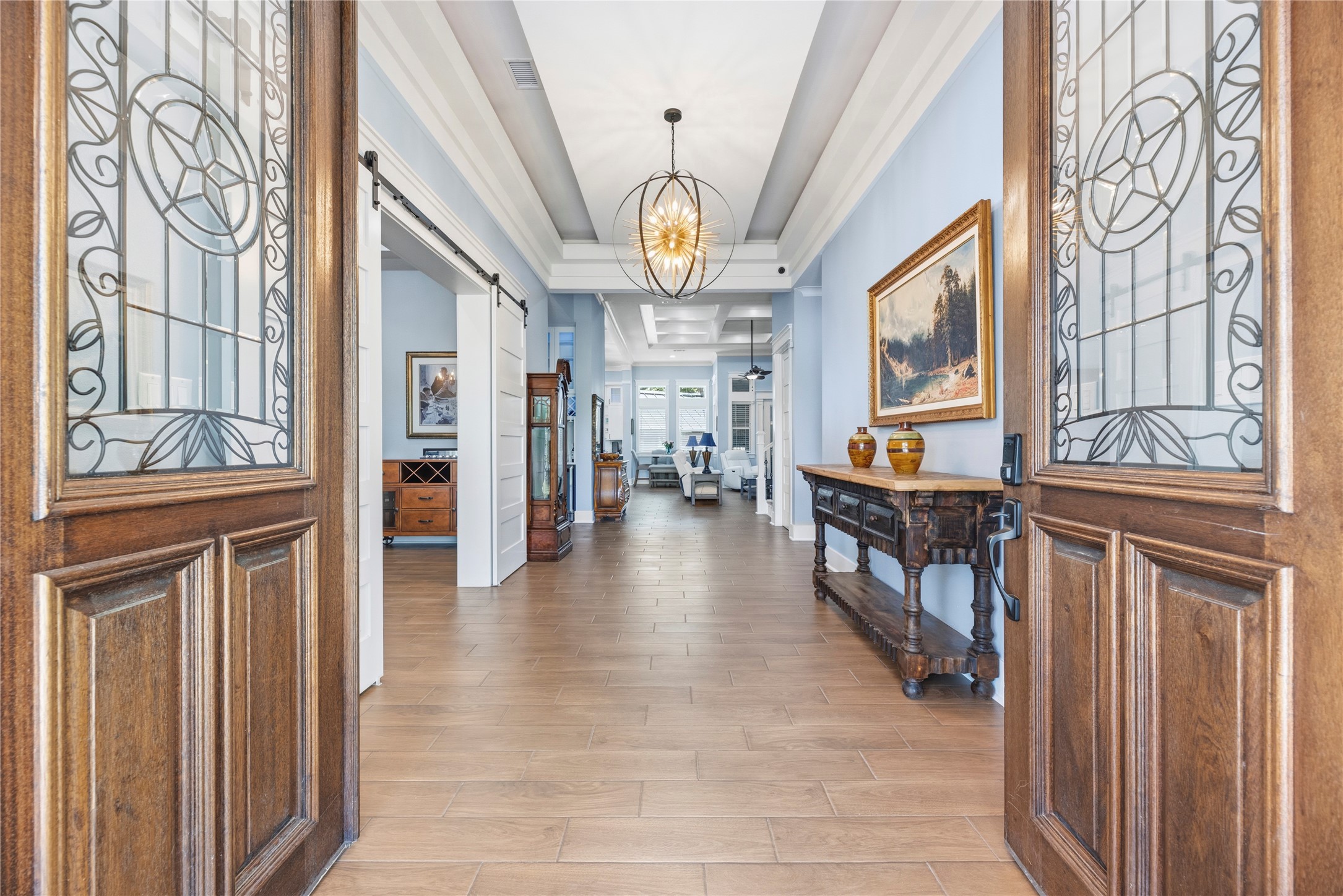 4607 Clayhead Road Richmond, TX 77406 - Photo 4 of 49 A grand entry welcomes you into refined interiors showcasing soaring ceilings, designer lighting, and sophisticated finishes curated for luxurious everyday living.