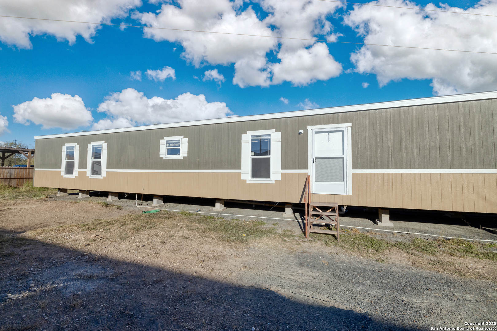 138 Senisa Drive Uvalde, TX 78801 - Photo 1 of 25 a view of a house with backyard and sitting area