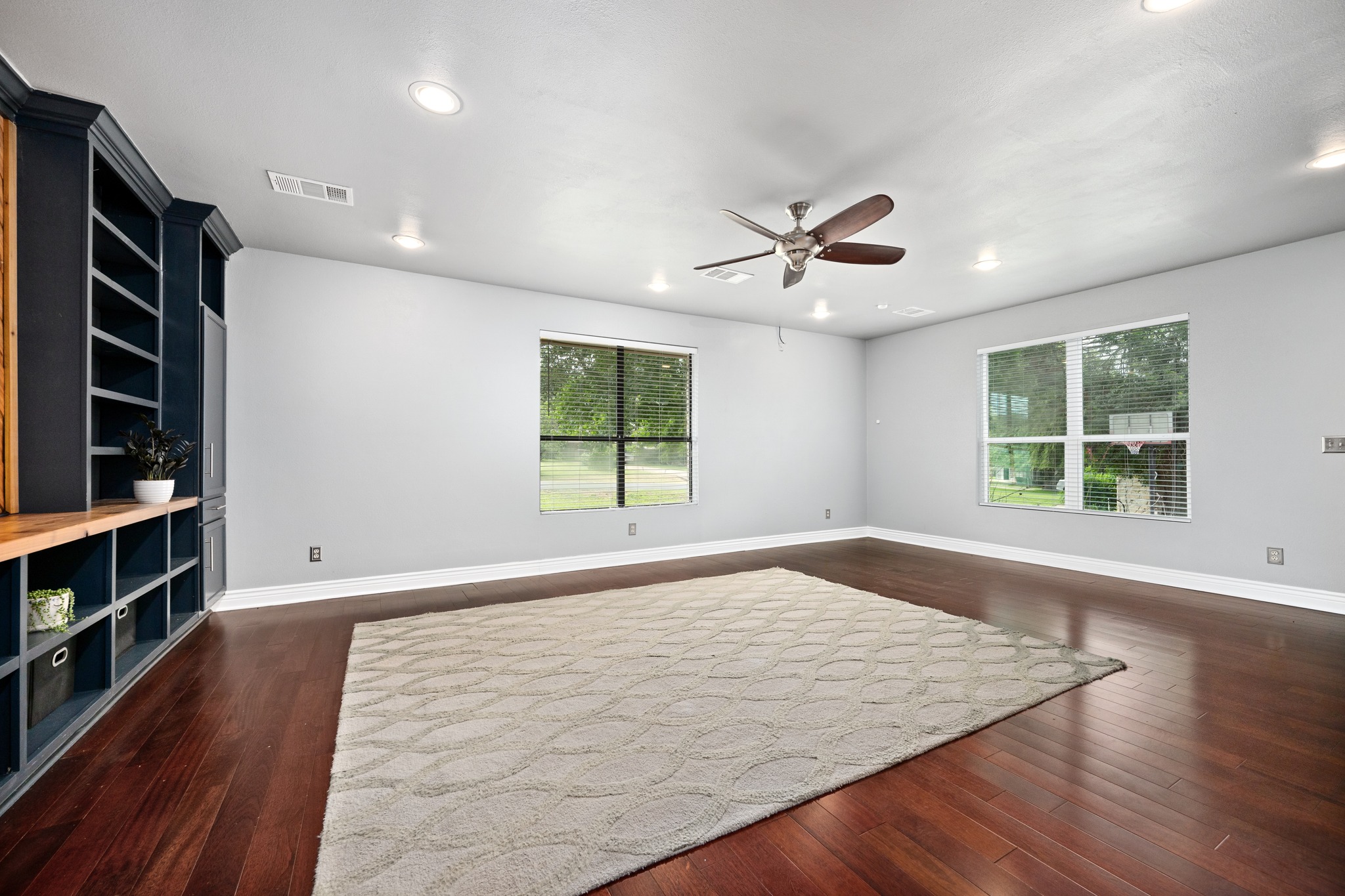 3908 Valley View Round Rock, TX 78681 - Photo 20 of 39 A massive flex space with built-ins and plenty of room for a game room, media setup, play space, or the ultimate hangout zone.