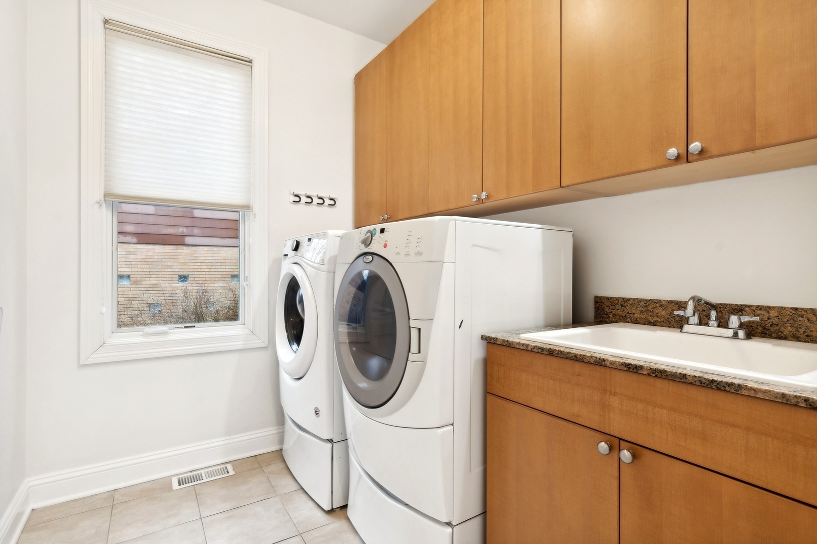 1603 Hertel Lane Deerfield, IL 60015 - Photo 12 of 27 a utility room with dryer and washer