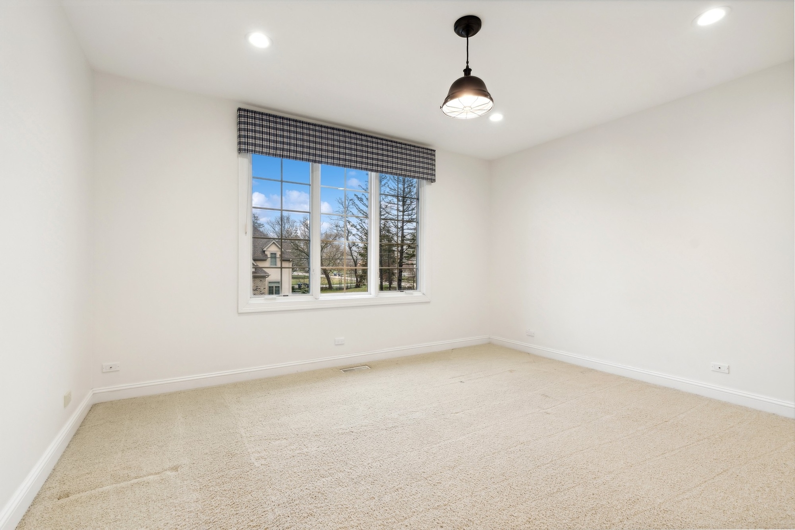 1603 Hertel Lane Deerfield, IL 60015 - Photo 16 of 27 a view of an empty room with a window