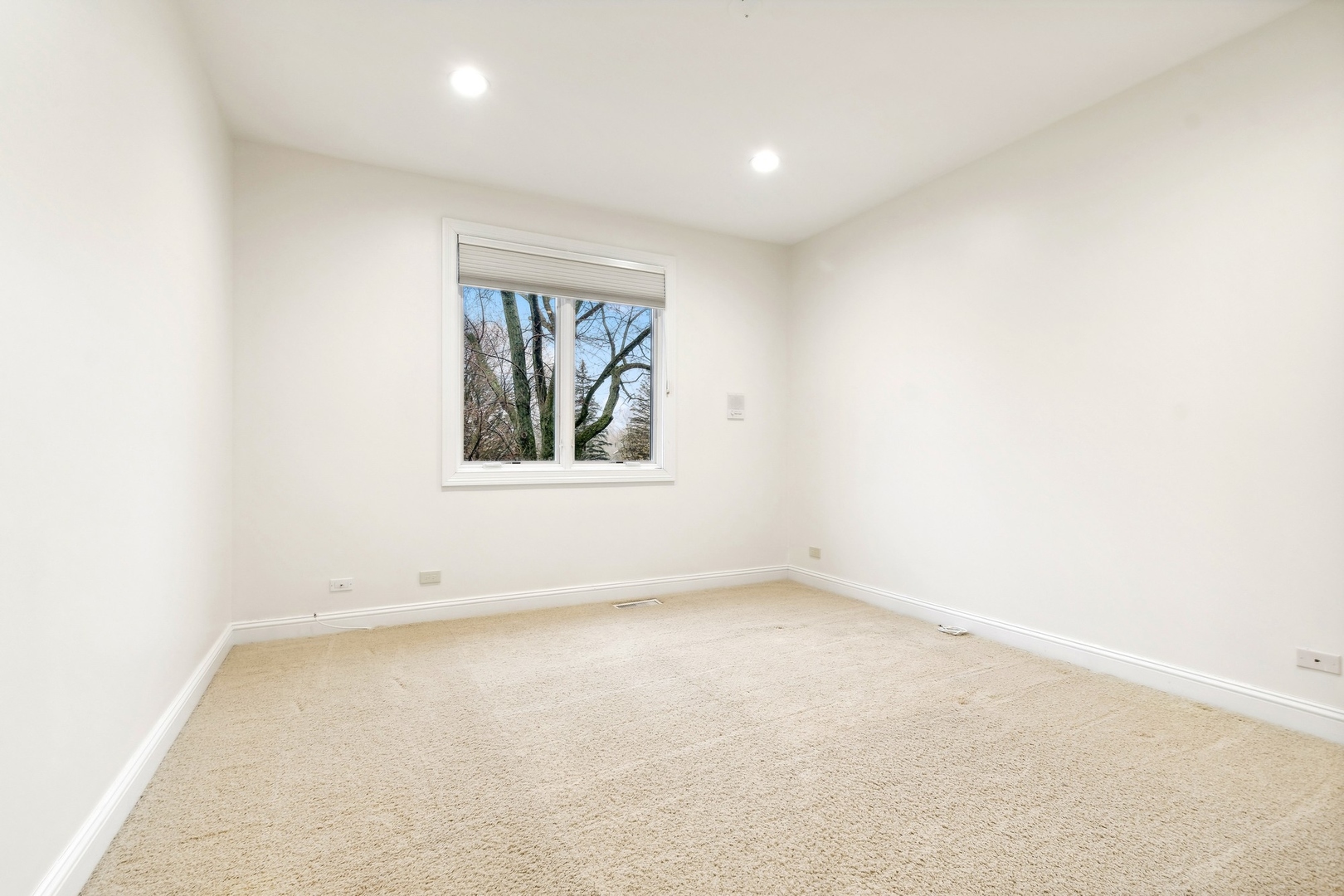 1603 Hertel Lane Deerfield, IL 60015 - Photo 19 of 27 an empty room with windows