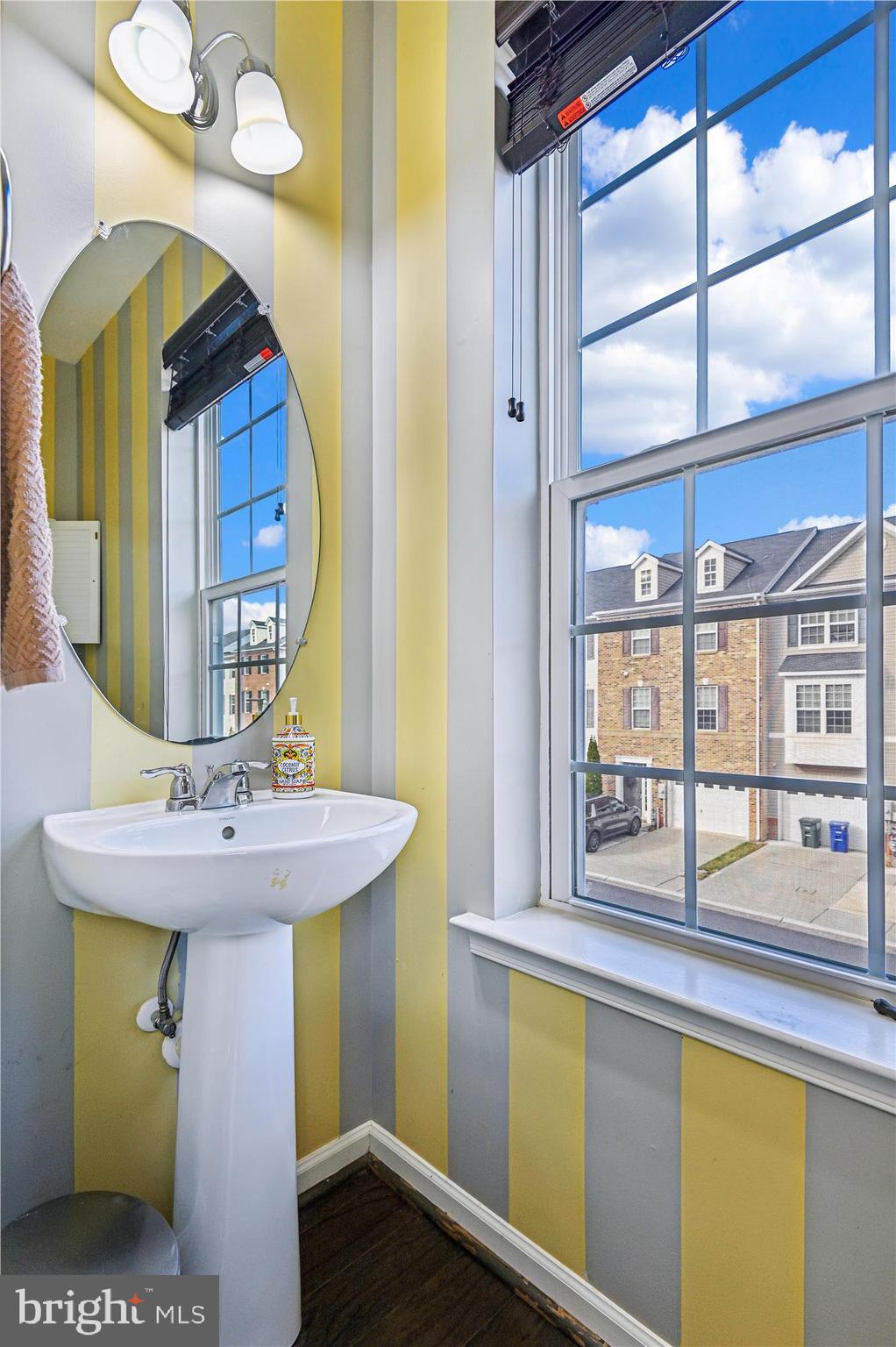 7749 Dagny Way Elkridge, MD 21075 - Photo 15 of 33 a bathroom with a sink and a mirror