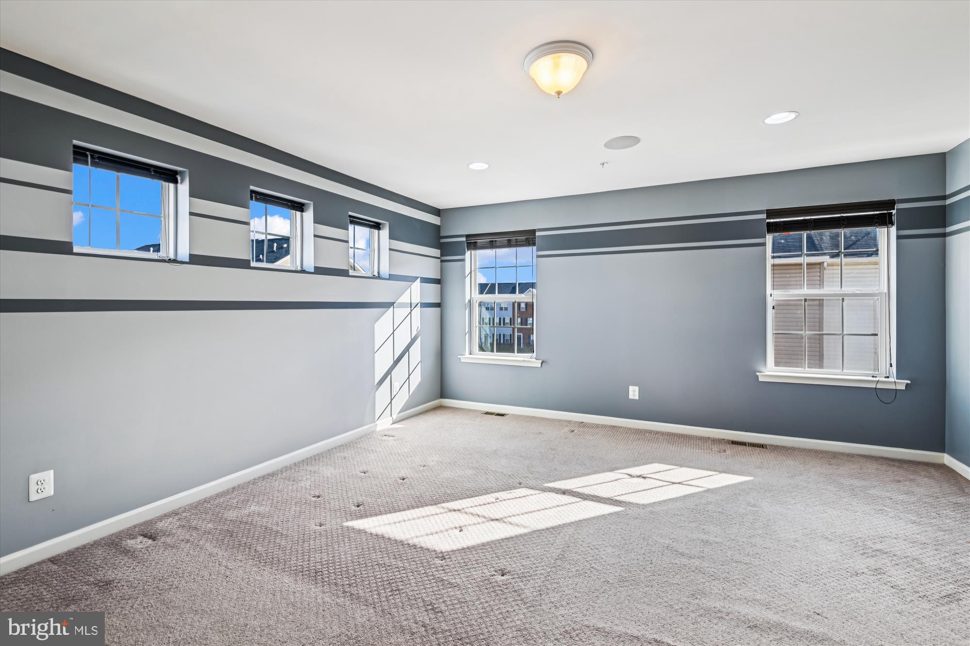 7749 Dagny Way Elkridge, MD 21075 - Photo 16 of 33 a view of an empty room with windows