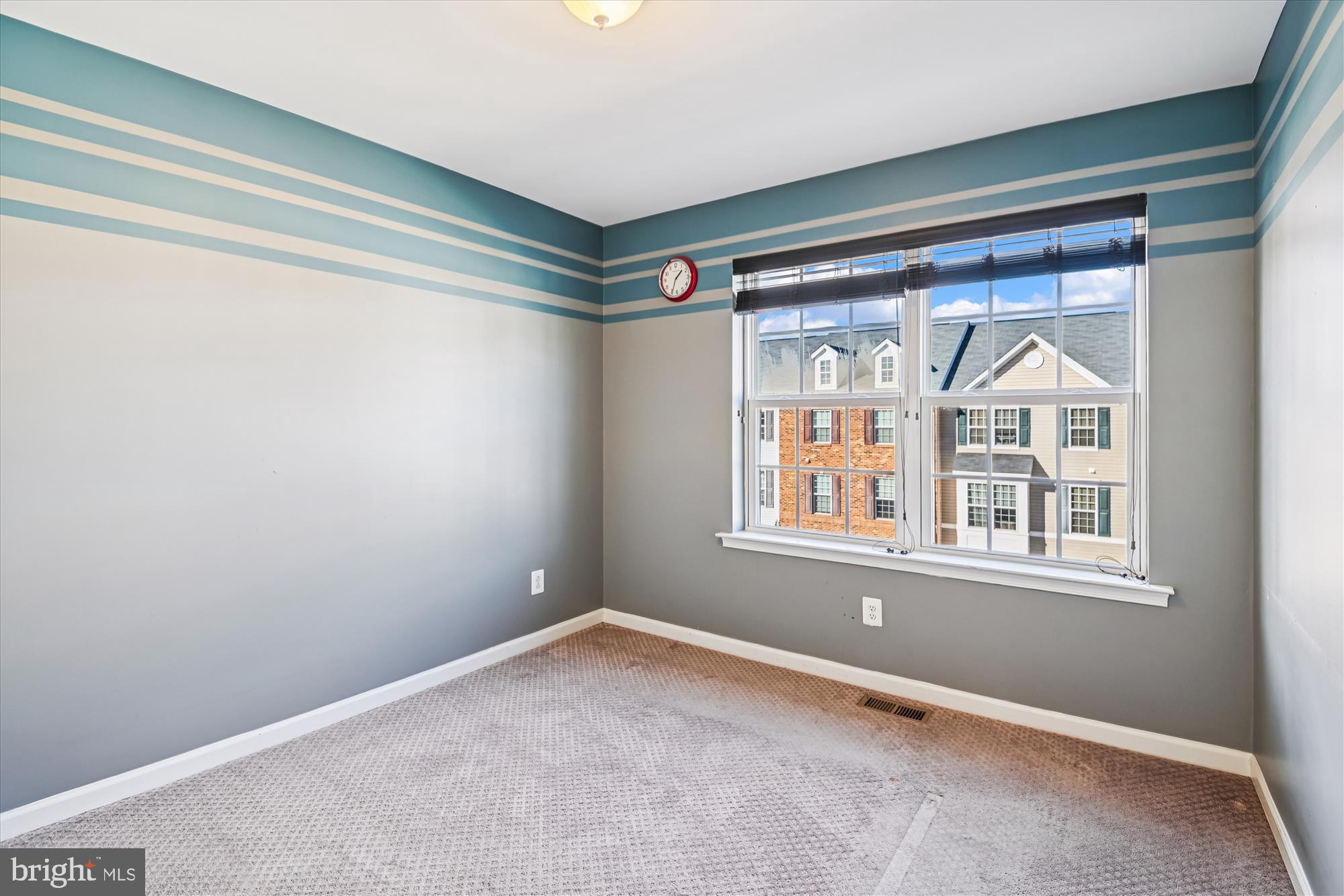 7749 Dagny Way Elkridge, MD 21075 - Photo 20 of 33 a view of an empty room with a window