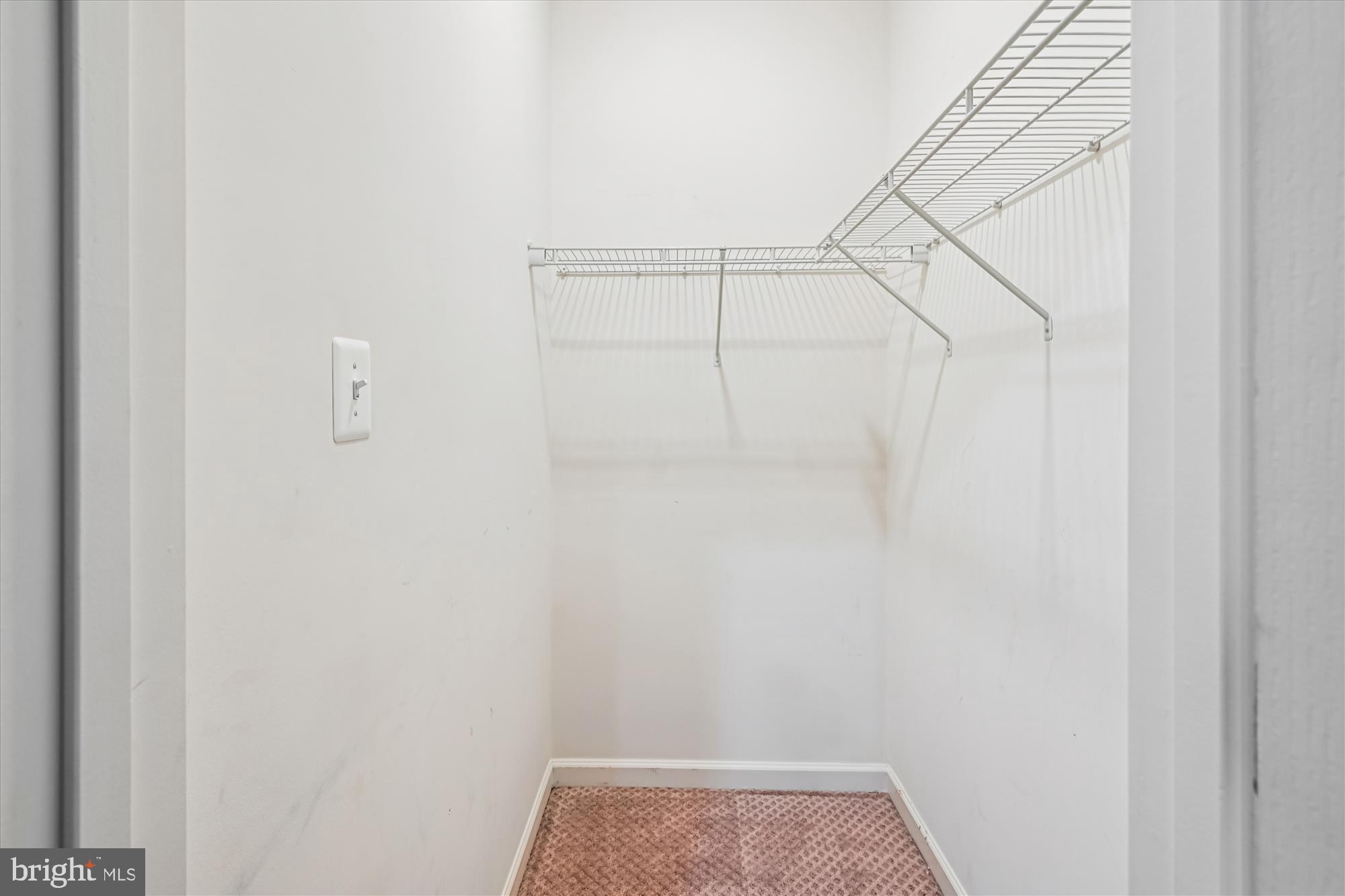 7749 Dagny Way Elkridge, MD 21075 - Photo 30 of 33 a view of small space with racks on the wall