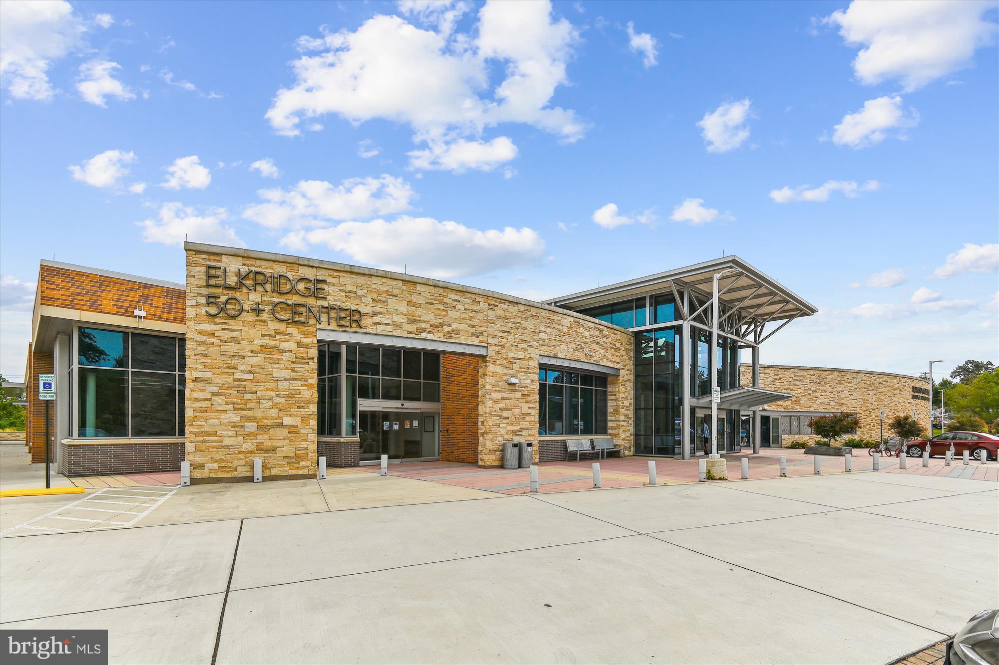 7749 Dagny Way Elkridge, MD 21075 - Photo 32 of 33 a front view of a house with a garden