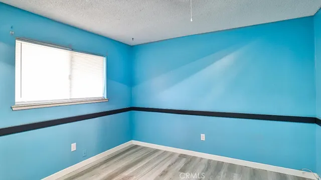 a view of a room with a window