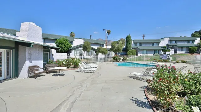 a view of a building with sitting area