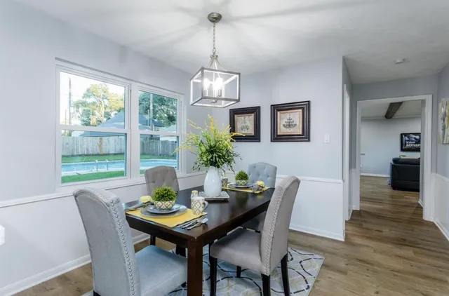 a bathroom with a shower curtain and a sink