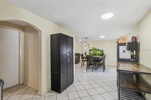 a kitchen with a sink cabinets and window