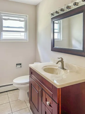 a bathroom with a sink and a toilet