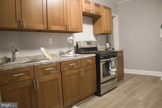 a bed room with a bed and a television