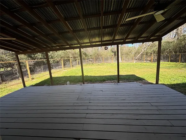 a view of a deck with wooden floor