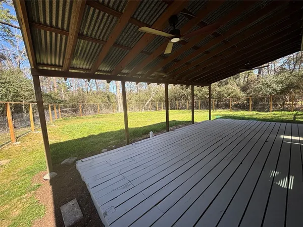 a view of porch with a garden