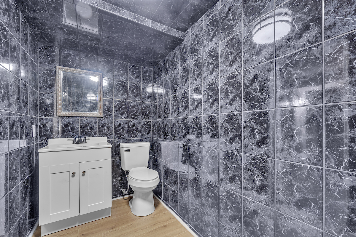 3320 Stonegate Road Waukegan, IL 60087 - Photo 16 of 21 a bathroom with a toilet and a sink