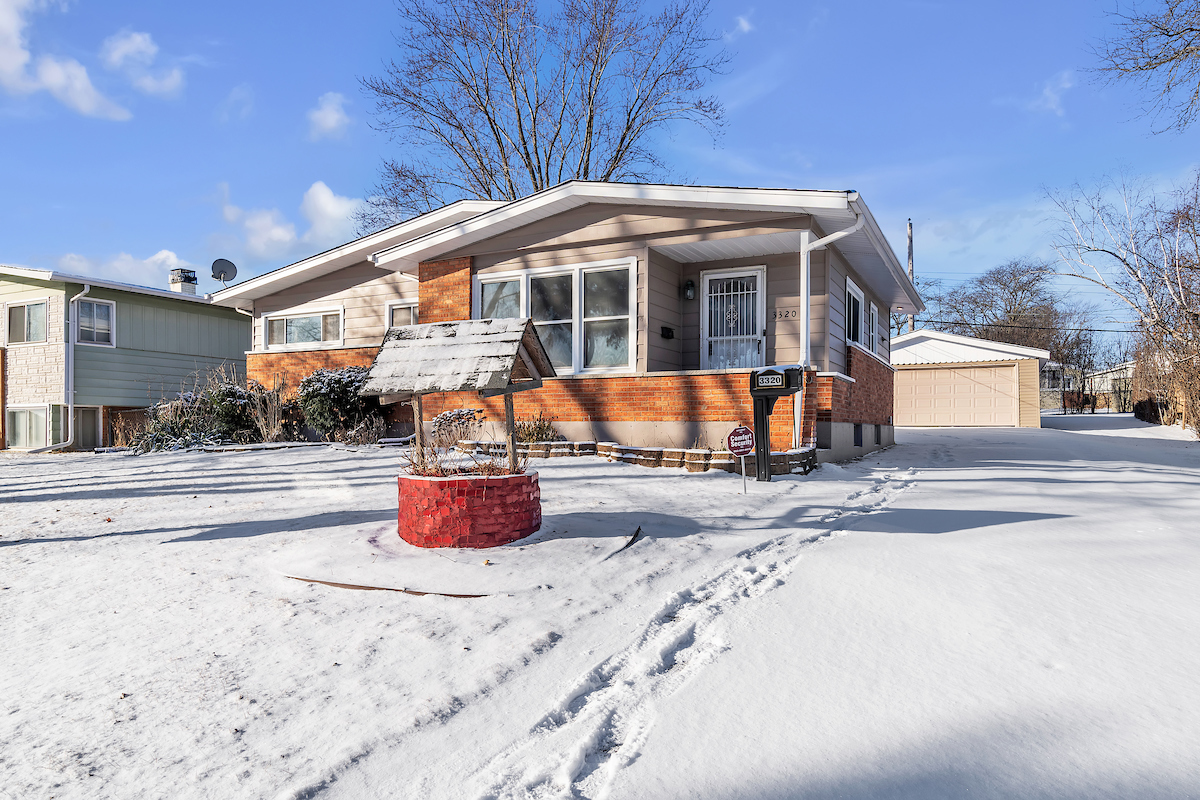 3320 Stonegate Road Waukegan, IL 60087 - Photo 2 of 21 a front view of house with outdoor seating