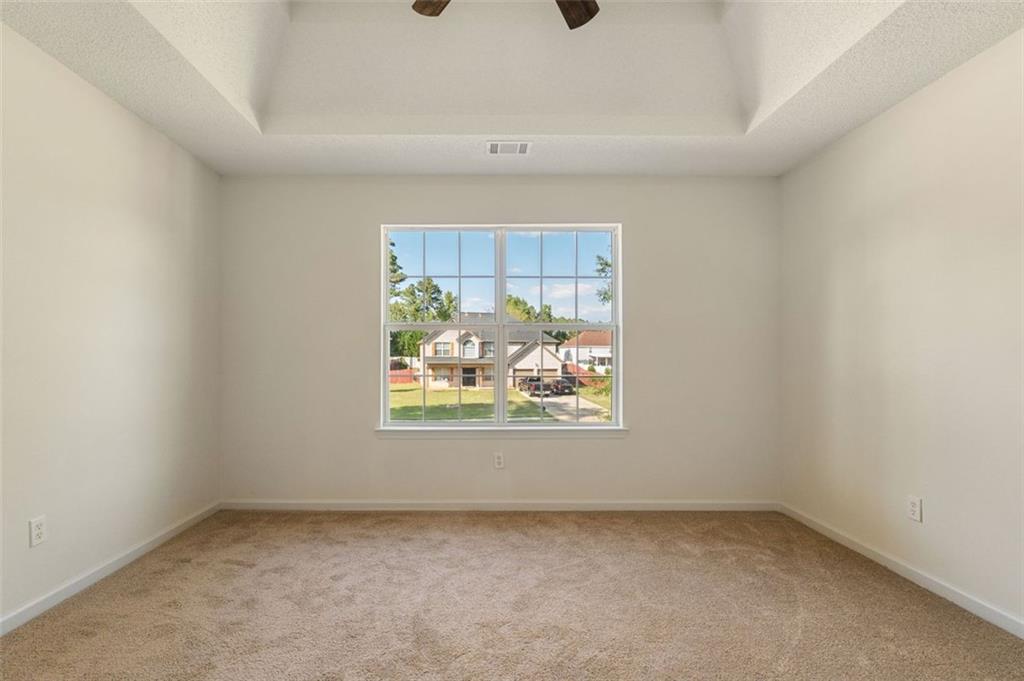 191 Kyndal Drive Hampton, GA 30228 - Photo 43 of 49 an empty room with a window