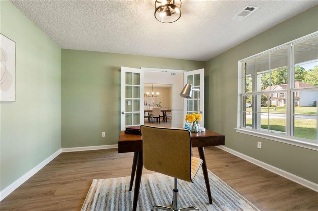 191 Kyndal Drive Hampton, GA 30228 - Photo 5 of 49 a dining room with furniture and windows